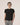 Black bamboo T-shirt with side seams and cuts, thermoregulating and eco-friendly for breathable, stylish loungewear or layering.