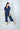 Model wearing Aspen Dream's Jolene Cropped Pajama Set in Navy with short sleeve top and cropped pants