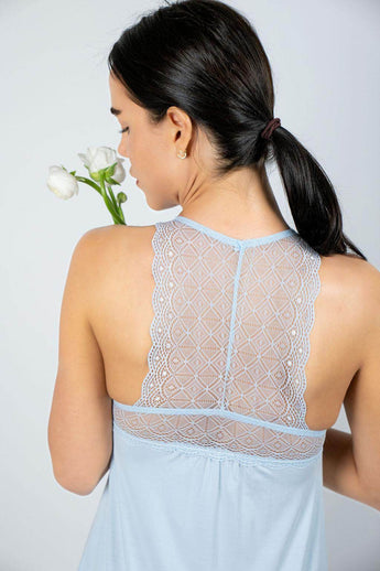 Baby Blue bamboo chemise with lace racerback and sheer lace underbust, offering breathable comfort and chic, body-hugging elegance.