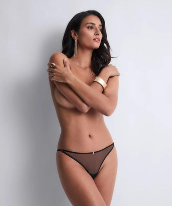 Model wearing the Aubade Hearts on Fire hipster brief in Glittery with sheer embroidered tulle