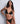 Model wearing the Aubade Velvet Snake set with triangle bra and mini-cœur brief in sheer snake-patterned tulle