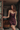 model wearing the Calista nightdress by Marjolaine with a V-neck and adjustable spaghetti straps in brun(brown)
