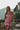 model wearing the Calista nightdress by Marjolaine with a V-neck and adjustable spaghetti straps in blush(pink)