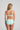 Mint Heart-shaped foam cup bra with daisy straps and silicone-backed support, convertible to halter or shoulder style.
