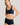 Classic seamless navy sports bra in soft ribbed fabric with light support and smooth fit, perfect for everyday comfort.
