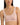 Classic seamless pink sports bra in soft ribbed fabric with light support and smooth fit, perfect for everyday comfort.