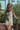 model wearing Clea nightdress by Marjolaine with floral satin and lace trim in white