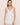 Eberjey Beatrix short white slip in TENCEL Modal with lace trim and plunge neckline.