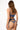 Back view of model wearing the Else Bella soft triangle bra showing adjustable straps and longline closure in lapis(blue)