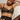 model wearing the Else Bella soft triangle bra in black with wireless unlined cups and longline mesh band