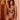 Model wearing Onyx Bodysuit with plunging neckline and embroidered Italian tulle