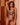 Model wearing Onyx Bodysuit with plunging neckline and embroidered Italian tulle