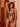 Model wearing Onyx Bodysuit with plunging neckline and embroidered Italian tulle