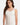 Fleur’t lace strap white camisole in soft TENCEL™ Modal with built-in shelf bra, lace trim, and mid-length fit for layering or lounging.