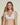 Forte white wireless bralette with French floral lace, plunge neckline, scalloped edges, and soft triangle cups for a bold, feminine look.
