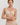 HANRO Satin Deluxe beige soft cup T-shirt bra in silky viscose with plunge neckline, padding, and matte gold hardware.
