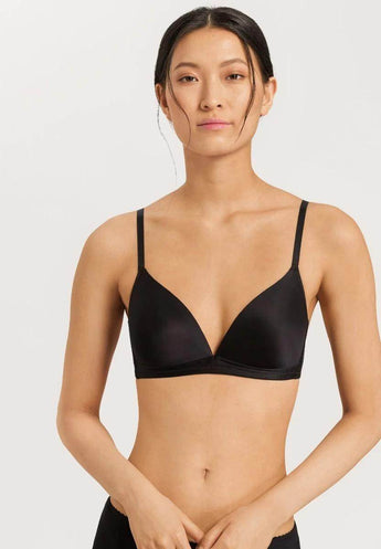 HANRO Satin Deluxe black soft cup T-shirt bra in silky viscose with plunge neckline, padding, and matte gold hardware.