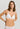 HANRO Satin Deluxe white soft cup T-shirt bra in silky viscose with plunge neckline, padding, and matte gold hardware.