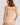 HANRO beige seamless V-neck camisole in mercerized cotton with satin trim and adjustable straps, perfect for layering or wearing alone.