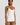 HANRO white seamless V-neck camisole in mercerized cotton with satin trim and adjustable straps, perfect for layering or wearing alone.