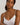HANRO white seamless V-neck camisole in mercerized cotton with satin trim and adjustable straps, perfect for layering or wearing alone.