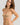 HANRO Touch Feeling beige spaghetti strap crop top in soft microfiber with seamless finish and light bust support for versatile wear.