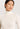 Close-up of Hanro Woolen Silk Turtleneck in white showing fine wool-silk blend and flat trim