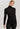 Model wearing Hanro Woolen Silk Turtleneck in black showing roll-neck collar and smooth fit