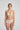 Caffee Heart-shaped padded foam bra in soft white with seamless finish, underwire support, and multi-way straps.