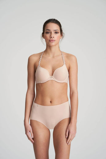 Caffee Heart-shaped padded foam bra in soft white with seamless finish, underwire support, and multi-way straps.