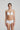 White Heart-shaped padded foam bra in soft white with seamless finish, underwire support, and multi-way straps.