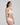 White Heart-shaped padded foam bra in soft white with seamless finish, underwire support, and multi-way straps.