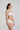 White Heart-shaped padded foam bra in soft white with seamless finish, underwire support, and multi-way straps.