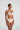 Cafe Heart-shaped foam cup bra with daisy straps and silicone-backed support, convertible to halter or shoulder style.