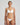 White Heart-shaped foam cup bra with daisy straps and silicone-backed support, convertible to halter or shoulder style.