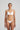 White Heart-shaped foam cup bra with daisy straps and silicone-backed support, convertible to halter or shoulder style.