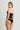 Back view of black bustier showing sheer mesh panel and zip closure