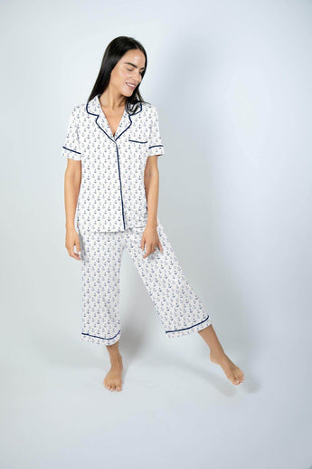 Model wearing Jolene Cropped Pajama Set in Anchor Print, front view with cropped pants and button-down top