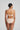 Marie Jo Rio briefs in beige with feather-light fabric, seamless back, Brazilian cut, and elegant pearl strap detail.