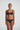 Marie Jo Rio briefs in black with feather-light fabric, seamless back, Brazilian cut, and elegant pearl strap detail.