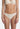 Marie Jo thong in pearl ivory with feather-light tulle and seamless finish for an invisible, soft, and elegant everyday fit.