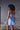 Back view of Marjolaine Betty Silk Satin Slip in Bleu Ciel with adjustable straps and elegant cut