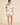 Olivia von Halle Ingo Cora ivory silk short pajama set with goldfish print and black piping from the back