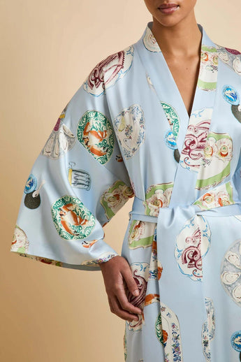 Close-up of the Olivia von Halle Queenie Cadiz Blue Seafood silk robe highlighting the exclusive Seafood print, shawl collar, self-tie belt, and luxurious 19 momme silk satin.