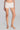 Model wearing Oscalito Silk Middle Rise Panties with Leavers Lace in white showing lace trim and rib-knit fabric