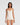 Model wearing Oscalito wool and silk V-neck camisole in ivory with satin trim showing neckline and fit