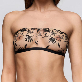 Front view of Sarda Shay non padded strapless bra in black with sheer floral embroidery and Swarovski® crystal details