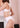 White silk suspender belt with lace front, designed to enhance curves and add elegance to your luxury lingerie look.