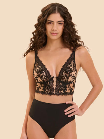 Black embroidered tulle bodysuit with plunging neckline, underwire cups, wide lace straps, and opaque microfiber bottom
