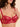 Model wearing the Simone Pérèle Intrigue sheer embroidered demi cup bra in opera red with floral embroidery, unlined tulle cups, and underwire support.